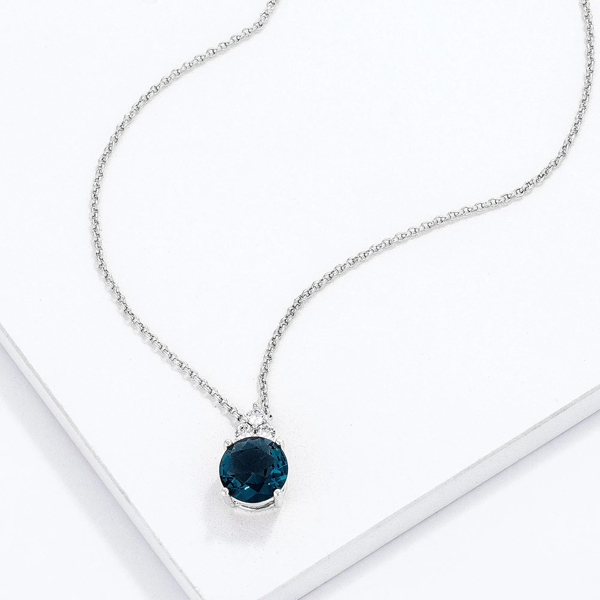 LOVCIA Rhodium Plated Pendant with Blue Green CZ and White Accents