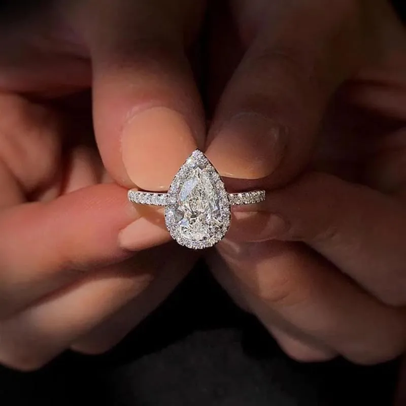Mnyixsi 925 Sterling Silver CZ Sparkling Full Diamond Platinum Waterdrop Pear Shaped Zircon Ring for Women Teardrop Engagement Rings Eternity Engagement Wedding Ring Promise Ring Size 8