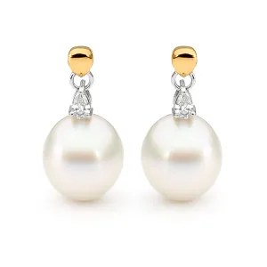 Pear shape diamond and pearl earrings