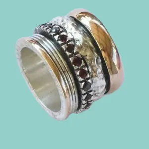 Spinner ring for woman. Engagement ring designers using Silver Gold Ring set with garnets / opals / zircons