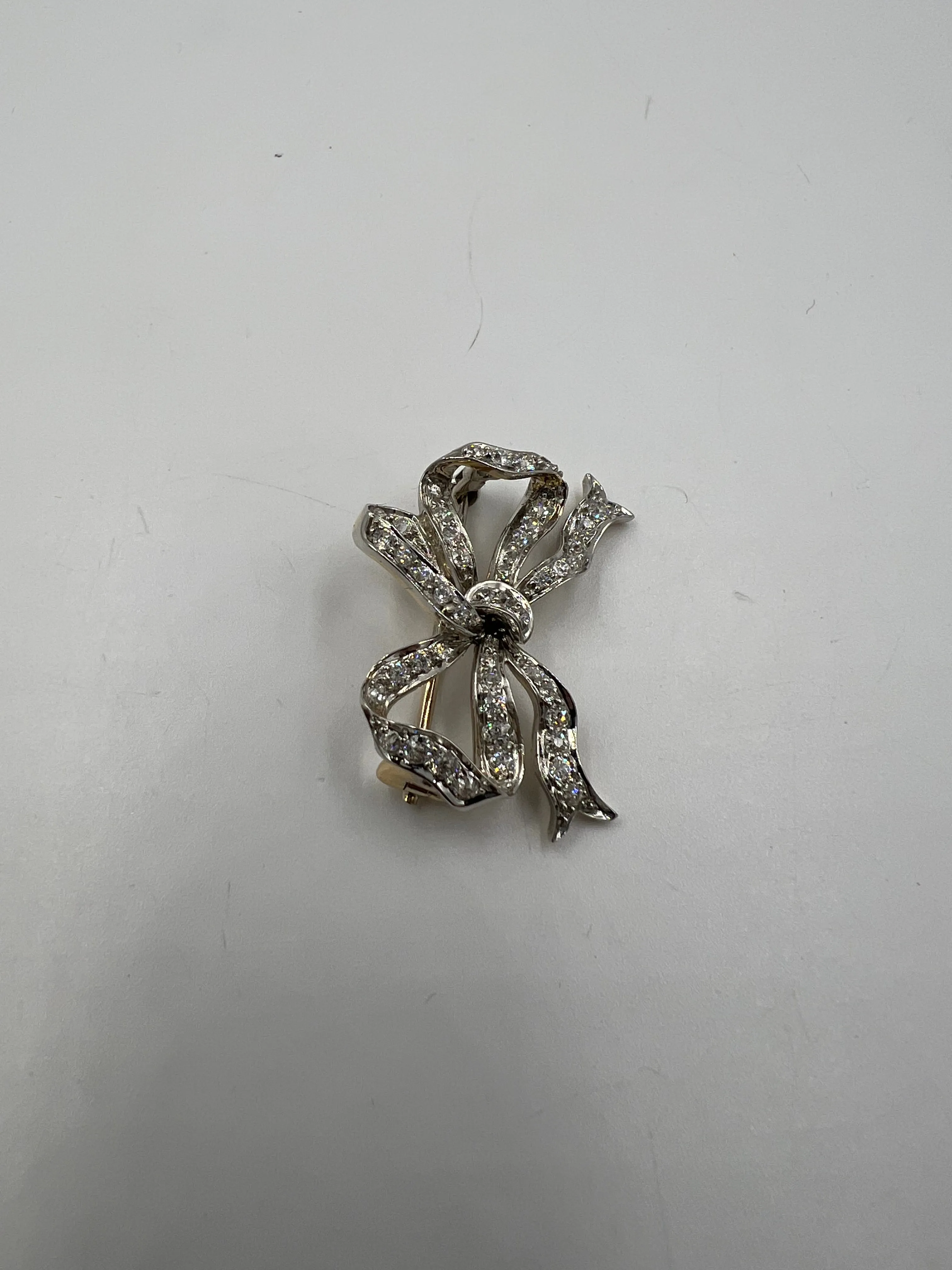 Tiffany Edwardian Old Mine Cut Diamond Platinum And 18k Gold Bow Brooch Circa 1910