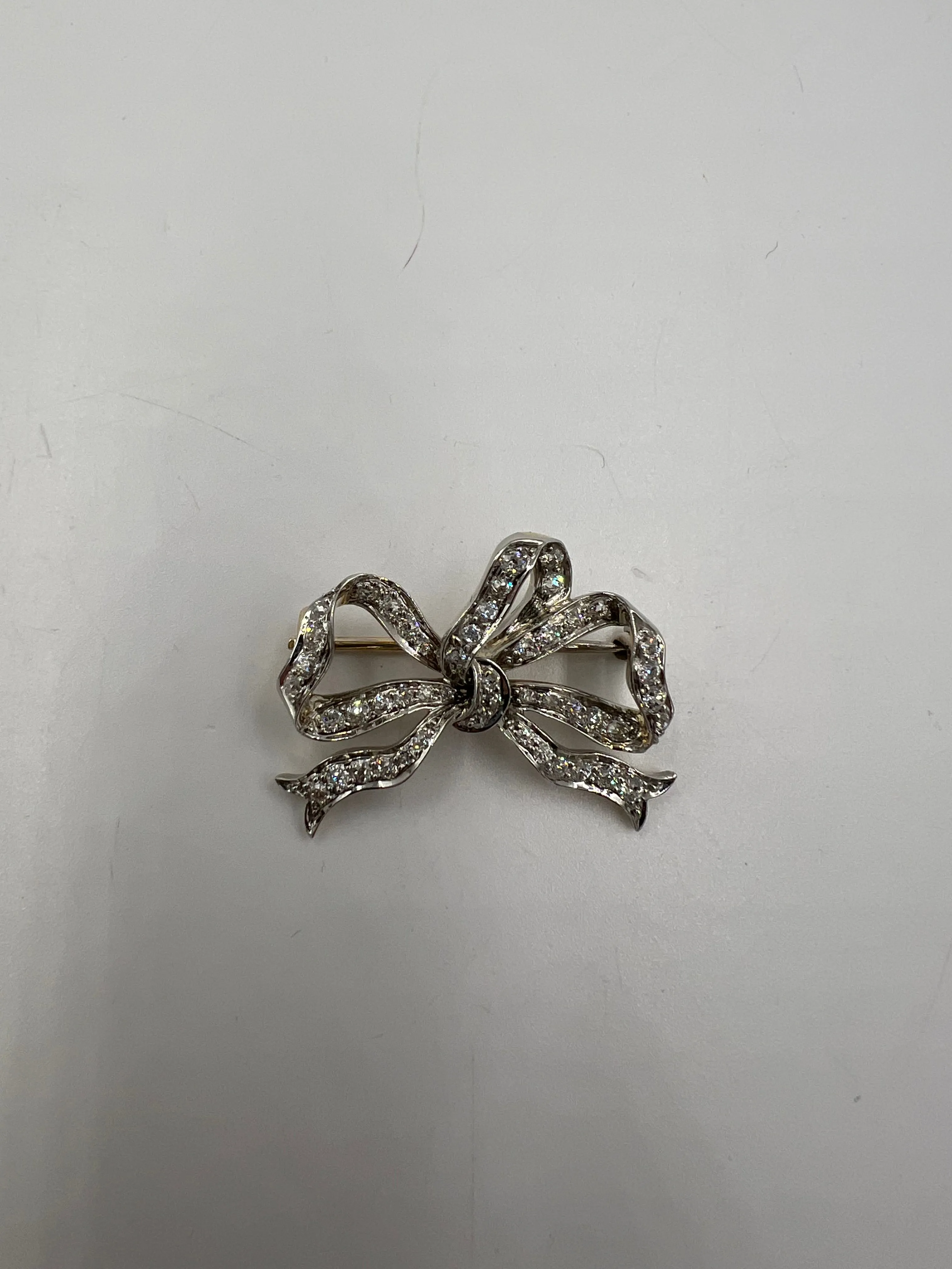 Tiffany Edwardian Old Mine Cut Diamond Platinum And 18k Gold Bow Brooch Circa 1910